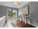 Bedroom features a deck with outdoor seating and lush greenery at 1519 N Westmoreland Dr, Orlando, FL 32804