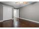 An unfurnished bedroom with a closet and hardwood floors at 1519 N Westmoreland Dr, Orlando, FL 32804