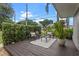 Inviting deck with outdoor seating and a view of the surrounding greenery at 1519 N Westmoreland Dr, Orlando, FL 32804