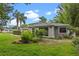 Charming home boasts lush landscaping, and manicured gardens at 1519 N Westmoreland Dr, Orlando, FL 32804