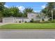 Charming two-story home with a manicured lawn and mature landscaping at 1519 N Westmoreland Dr, Orlando, FL 32804
