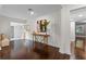 Bright foyer featuring hardwood flooring, white walls, and a view to the living areas at 1519 N Westmoreland Dr, Orlando, FL 32804