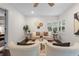 Cozy living room featuring neutral tones, plantation shutters, and stylish decor at 1519 N Westmoreland Dr, Orlando, FL 32804