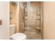 Bathroom with glass enclosed shower and built in shelves at 16103 Denham Ct, Clermont, FL 34711