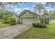 Charming single-story home featuring a two-car garage and manicured landscaping at 16103 Denham Ct, Clermont, FL 34711