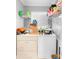 The laundry room features modern washer and dryer units at 1647 Crestlawn Ave, Orlando, FL 32811