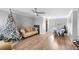 Living room view includes hardwood floors and a ceiling fan at 1647 Crestlawn Ave, Orlando, FL 32811
