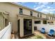 Exterior view of backyard featuring a screened patio and privacy fence at 178 Windflower Way, Oviedo, FL 32765