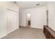 A bright bedroom features a large closet and easy access to a nearby bathroom, for extra convenience at 178 Windflower Way, Oviedo, FL 32765