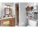 Bathroom featuring a vanity with mirror and a shower at 1877 Attucks Ave, Orlando, FL 32811