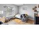 Small bedroom with window and personal belongings at 1877 Attucks Ave, Orlando, FL 32811