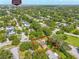 An aerial view shows the location of the home in a tree-filled neighborhood near Winter Park at 1901 Loch Berry Rd, Winter Park, FL 32792