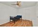 This bedroom offers wood-look floors and a closet for storage at 1940 S Conway Rd # 8, Orlando, FL 32812
