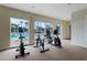 Exercise room with view of the pool and equipment at 1940 S Conway Rd # 8, Orlando, FL 32812