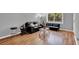 Cozy living room with hardwood floors, comfortable seating, and lots of light at 1940 S Conway Rd # 8, Orlando, FL 32812