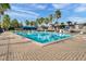 Stunning community pool with lounge chairs and plenty of shade at 1940 S Conway Rd # 8, Orlando, FL 32812