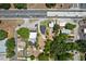 Aerial view of the neighborhood featuring well-maintained homes, streets, and greenery at 209 N 14Th St, Leesburg, FL 34748