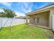 A cozy backyard with a swing set and a covered patio, perfect for relaxation or entertaining at 2246 Florida Soapberry Blvd, Orlando, FL 32828