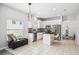 Bright kitchen with stainless steel appliances and seamless flow to dining and living area at 2246 Florida Soapberry Blvd, Orlando, FL 32828
