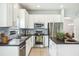 Modern kitchen featuring stainless steel appliances, sleek countertops and ample cabinet space at 2246 Florida Soapberry Blvd, Orlando, FL 32828