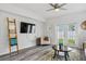 Comfortable living room with a fan, neutral color palette and stylish decor at 2246 Florida Soapberry Blvd, Orlando, FL 32828