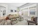 Inviting living space showcases modern decor, wood-style flooring, and a bright, airy atmosphere at 2246 Florida Soapberry Blvd, Orlando, FL 32828