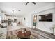 Open-concept floor plan seamlessly connects the kitchen, living and dining areas at 2246 Florida Soapberry Blvd, Orlando, FL 32828