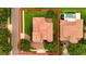 An aerial view of a large home with a well-manicured lawn and a swimming pool in the backyard at 2258 Rickover Pl, Winter Garden, FL 34787