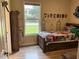 Bedroom with superhero theme, natural light, and laminate floors at 2258 Rickover Pl, Winter Garden, FL 34787