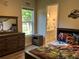 themed bedroom with a dresser and ensuite bathroom at 2258 Rickover Pl, Winter Garden, FL 34787