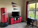 View of the bedroom with a desk, large window and colorful wall art at 2258 Rickover Pl, Winter Garden, FL 34787