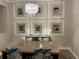 Chic dining room features modern chandelier and seating for four at 2258 Rickover Pl, Winter Garden, FL 34787