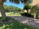 Paved driveway leading to a two-story home with well maintained landscaping at 2258 Rickover Pl, Winter Garden, FL 34787