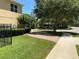 Well-maintained yard next to a two-story home with manicured landscaping at 2258 Rickover Pl, Winter Garden, FL 34787