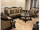 Opulent living room showcasing elegant furniture and hardwood flooring at 2258 Rickover Pl, Winter Garden, FL 34787