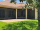 Covered outdoor living space featuring a screen enclosure, brick flooring and views of the landscaped yard at 2258 Rickover Pl, Winter Garden, FL 34787