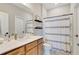 Bathroom with quartz countertop vanity and shower tub combination at 2335 Green Symphony Pl, Oviedo, FL 32765