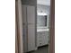 Bathroom features a white vanity with granite countertop and ample storage at 234 Afton Sq # 305, Altamonte Springs, FL 32714