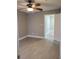 Bedroom featuring tile floors, ceiling fan, light gray walls, and white trim at 234 Afton Sq # 305, Altamonte Springs, FL 32714