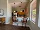 Cozy kitchen bar with wooden cabinets and stainless steel appliances at 234 Afton Sq # 305, Altamonte Springs, FL 32714