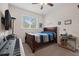 Bedroom with a ceiling fan, window for natural light, and plenty of room for furniture at 2502 Seven Oaks Dr, St Cloud, FL 34772