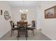 Cozy dining room featuring a charming table set, stylish decor, and a warm ambiance at 2502 Seven Oaks Dr, St Cloud, FL 34772