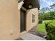 Exterior close up showing front door, stucco, and walkway at 2502 Seven Oaks Dr, St Cloud, FL 34772