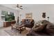 Bright living room boasting comfortable seating, contemporary decor, and ample natural light at 2502 Seven Oaks Dr, St Cloud, FL 34772