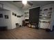 Inviting living room featuring a cozy fireplace and built-in bookshelves at 2847 Cr 756, Webster, FL 33597