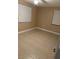 This bedroom features tile flooring and a double window at 2847 W Harwood St # 0, Orlando, FL 32805