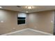 Neutral bedroom offers abundant natural light and ceramic tile floors at 2847 W Harwood St # 0, Orlando, FL 32805