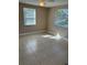 Bedroom with tile flooring and multiple windows allowing for ample natural light at 2847 W Harwood St # 0, Orlando, FL 32805