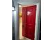 Charming entryway featuring a red door and ceramic tile flooring at 2847 W Harwood St # 0, Orlando, FL 32805