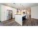 New kitchen features an oversized island, stainless appliances, and ample cabinet space at 300 Mitnik Dr, Deltona, FL 32738